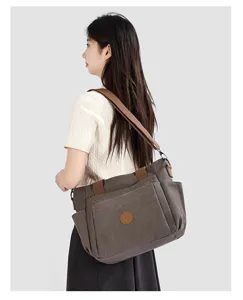 Vue détaillée du sac cabas fourre-tout en toile décontracté pour femme, grande capacité.