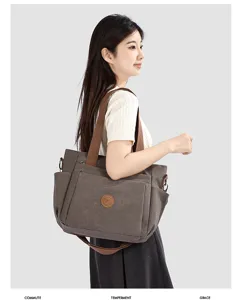Sac bandoulière décontracté en toile pour femme, grand cabas de travail avec poches.