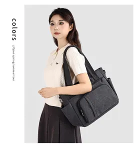 Vintage canvas shoulder tote bag casual large capacity travel handbag with multiple pockets.