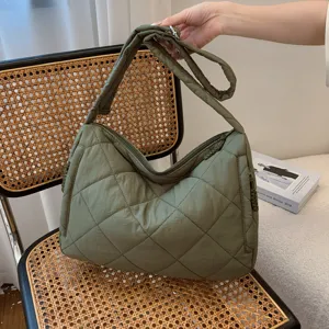 Green quilted shoulder bag for women, large capacity puffer crossbody bag with soft strap.