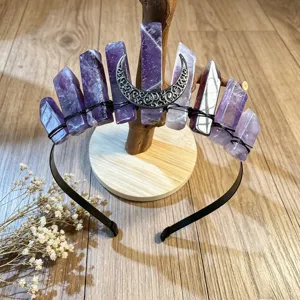 Detail view of handmade crystal crown headband with purple amethyst points and silver crescent moon.