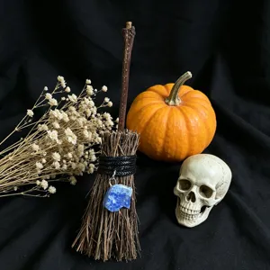 Miniature witch broom detail with blue crystal stone, perfect for Halloween spooky decor.