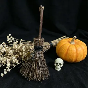 Halloween miniature decorative broom ornament with crystal pendant and natural twigs for party.