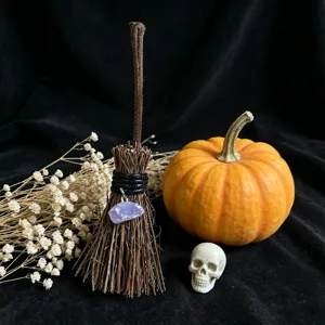 Mini witch broom Halloween decoration with crystal pendant and pumpkin props for holiday styling.