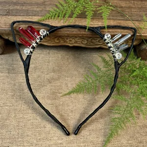 Handcrafted black cat ear headband featuring stunning red and clear raw crystal clusters with wire wrap.
