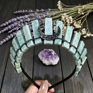 Handmade crystal tiara headband with natural green stone pillars and a black moon charm.