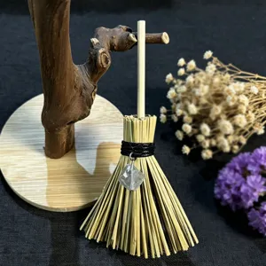 Mini witch broom hanging ornament with crystal pendant for car rear view mirror decor.