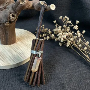 Handmade mini crystal broom ornament, rustic twig witchcraft broom for festival and home decor.