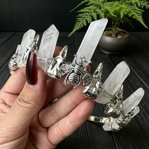 Gothic crystal crown headband with raw quartz points and metal beetle skull charms for women.