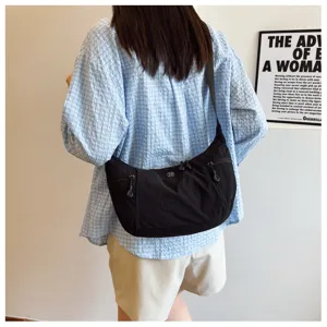 Casual nylon shoulder bag for women, lightweight crossbody design, stylish daily street travel.