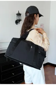Minimalist travel duffel bag for men and women, lightweight short trip luggage bag and gym tote.