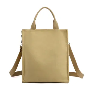 Casual canvas tote bag for women, large capacity shoulder and messenger bag with top handles.