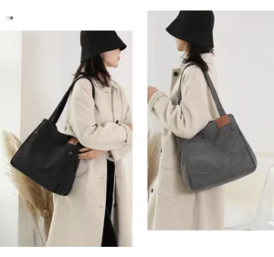 Grand sac à bandoulière en toile pour femme, style cabas quotidien minimaliste décontracté.