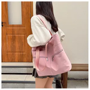 Stylish pink nylon tote bag for women, large capacity shoulder bag for daily casual use.
