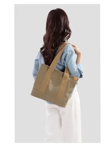 Casual canvas tote bag for women, large capacity daily shoulder bag, simple stylish design.