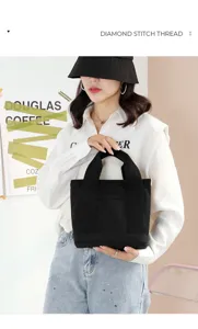 Casual black canvas tote bag for women, versatile large capacity handbag with top handles.