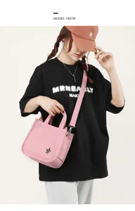 Borsa a mano da donna in tela rosa, borsa a tracolla versatile per il commuting quotidiano.