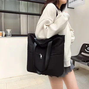 Stylish black nylon tote bag for women, large capacity casual shoulder bag for daily use.