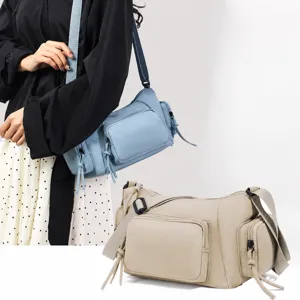 Stijlvolle nylon schoudertas met meerdere vakken, casual crossbody tas voor dagelijks gebruik.