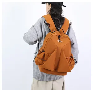 Casual pleated nylon canvas backpack detail showing straps and unique design features.