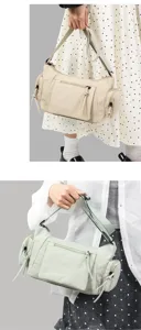 Multi-pocket canvas retro underarm shoulder bag detail showing multi-compartment design.