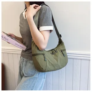 Nylon crossbody shoulder bag for women, lightweight casual hobo bag with pockets.