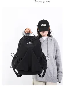 Casual black nylon drawstring backpack with pleated design, large capacity student school bag.