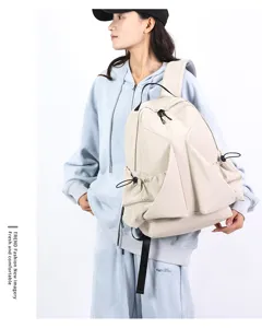 Casual pleated nylon canvas backpack detail view, large capacity student school bag.