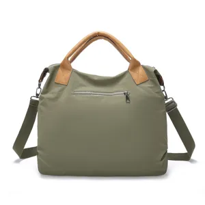 Retro nylon crossbody shoulder bag for women, large capacity tote bag with brown leather handles.