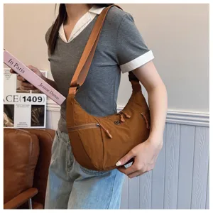 Nylon crossbody shoulder bag for women, casual lightweight street style hobo handbag.