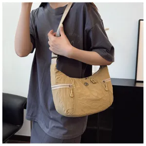 Casual nylon crossbody shoulder bag for women, lightweight daily travel bag with zipper pockets.