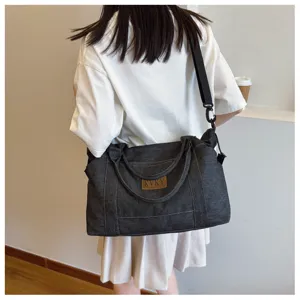 Borsa a tracolla in denim casual grande capacità borsa da viaggio con cinghia forte.