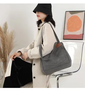 Sac bandoulière en toile grande capacité polyvalent pour femme, design d'automne élégant.