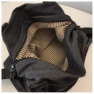 Borsa a tracolla casual in denim, grande borsa da viaggio con fodera interna a righe.