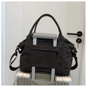 Borsa da viaggio in denim casual di grande capacità, tracolla e custodia per valigia.