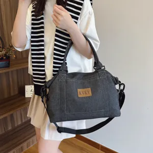 Borsa a tracolla in denim scuro elegante con grande capacita per viaggio quotidiano