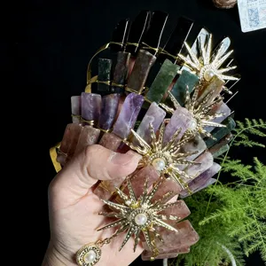 Natural crystal crown hair comb with sun goddess charms and pearls, handmade festival hair accessory.