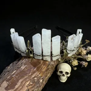 Gothic natural white quartz crystal crown headband featuring bronze crow skull metal details.