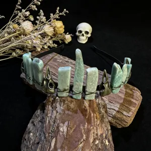 Gothic crystal crown headband with raven skull details, perfect festival hair accessory.
