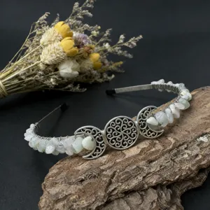 Handmade natural crystal moon crown headband with metal wire and raw crystal gemstone chips.