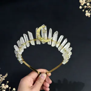 Crystal crown tiara detail featuring raw quartz points and gold moon star charm design.