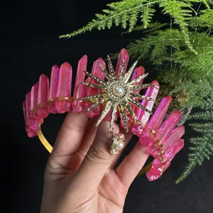 Detailed pink crystal crown headband featuring sun goddess charm and elegant pearl pendant