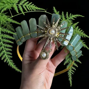 Green crystal crown headband with sun goddess charm, elegant boho festival hair accessory.