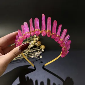 Detailed shot of pink crystal crown headband with raw quartz stones and gold wire wrapping.