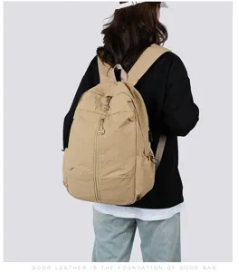 Casual canvas backpack for daily travel, lightweight school bag for students in khaki.