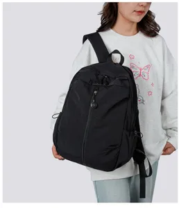 Black lightweight casual backpack designed for daily commute, school and outdoor travel.