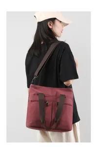 Canvas shoulder bag for women, casual tote bag with zipper pockets, stylish daily handbag.