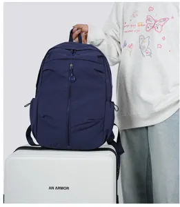 Casual dark blue backpack for students, lightweight daily school book bag and travel daypack.