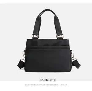 Black nylon shoulder bag for women, multi-layer casual tote handbag with top handles.