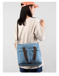Casual canvas shoulder bag for women, large capacity daily crossbody tote purse style.